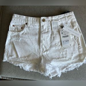 High waisted white denim Zara shorts.